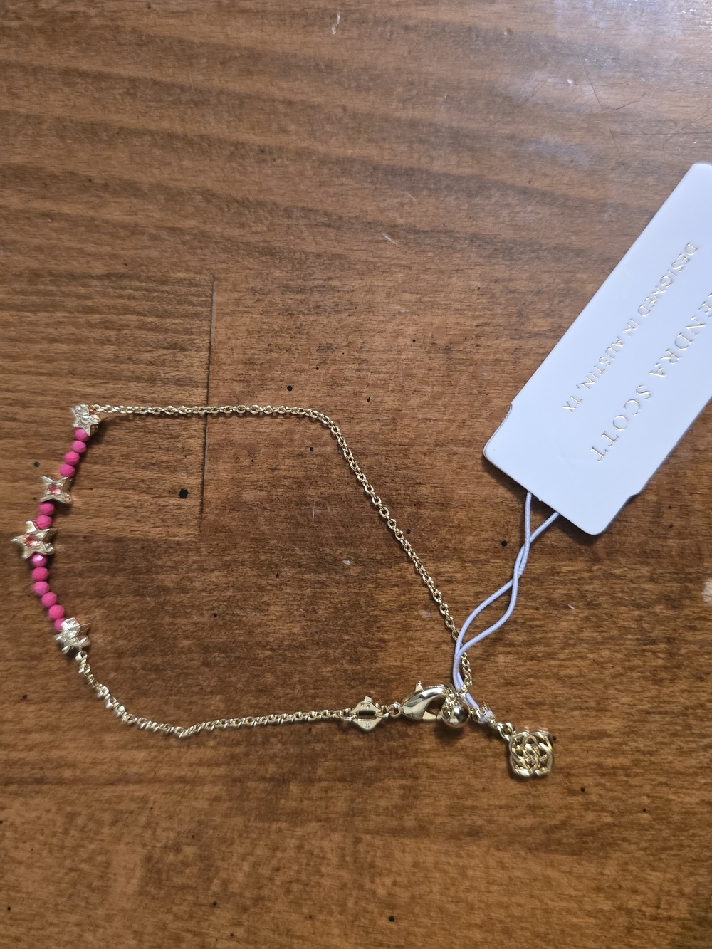 Gold-Tone Bracelet with Red Bead Accents by Kendra Scott